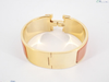 Secondhand Hermès Clic H Orange Metal Jewelry
