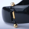 Secondhand Sculptural Black Resin Cuff with Gold-Tone Closure - '00s
