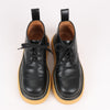 Bottega Veneta The Bounce Leather Short Boots in Black x Mustard, Size 39 EU Secondhand
