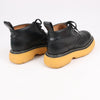 Bottega Veneta The Bounce Leather Short Boots in Black x Mustard, Size 39 EU Secondhand