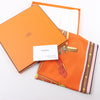Hermès Carré 90 "LETTRES EQUESTRES" 100% Silk Scarf in Orange Secondhand