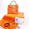 HERMÈS Kelly 28 Le Tournay Taurillon Clemence Handbag in Orange Silver Metal Fittings □H: 2004 Secondhand