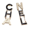 Chanel Gold Plated and Enamel Cha-Nel Logo Drop Push Back Earrings Secondhand