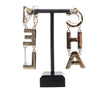 Chanel Gold Plated and Enamel Cha-Nel Logo Drop Push Back Earrings Secondhand