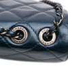 Chanel Quilted Glazed Calfskin Coco Pleats Flap Secondhand