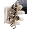 Secondhand Chanel CC Quilted Lambskin Coco Charms Chain Wristlet Pouch