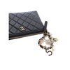 Secondhand Chanel CC Quilted Lambskin Coco Charms Chain Wristlet Pouch
