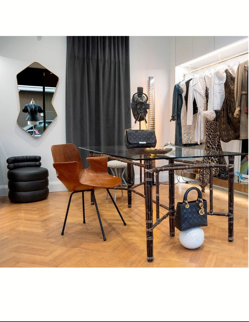 Pre owned designer handbags and curated vintage fashion inside Her-Age Milan luxury resale boutique