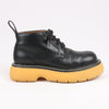 Bottega Veneta The Bounce Leather Short Boots in Black x Mustard, Size 39 EU Secondhand