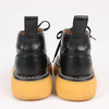 Bottega Veneta The Bounce Leather Short Boots in Black x Mustard, Size 39 EU Secondhand