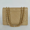 Chanel Timeless Classica turn lock bag in beige leather