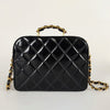 Chanel Vanity shoulder bag in patent matelassé leather