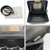 Chanel quilted cosmetic bag in black leather and gold chain