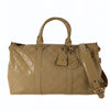 Chanel quilted travel bag in beige patent leather