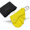 Dior Saddle pouch key ring in fluorescent yellow leather