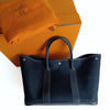 Hermès Garden Party handbag in black canvas and leather