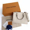 Louis Vuitton OnTheGo Empreinte PM shoulder bag in ivory leather