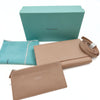 Tiffany & Co. wallet with shoulder strap in beige leather