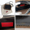 Valentino Garavani Rockstud shearling shoulder bag in black patent leather