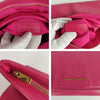 Yves Saint Laurent maxi clutch bag in fuchsia leather